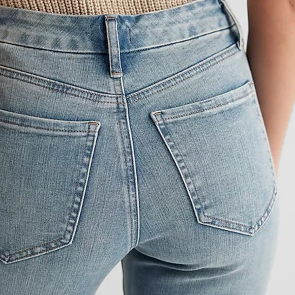 Express Mid Rise Light Wash Raw Hem FlexX '70s Flare Jeans - Picture 5 of 5